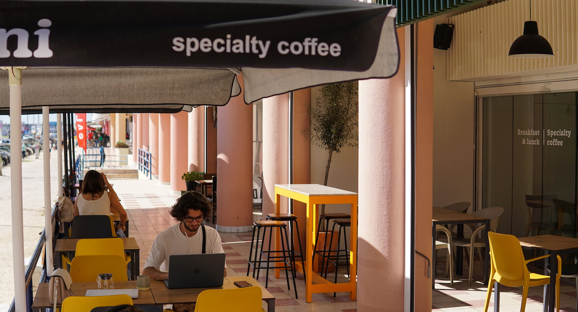 Cozy interior of Hani Café with remote workers